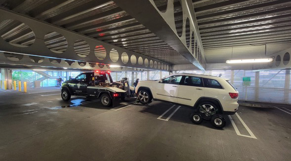 Parking garage tow